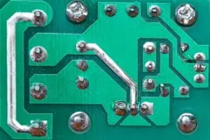PCB ground planes must provide consistent reference voltage and short signal return pathways