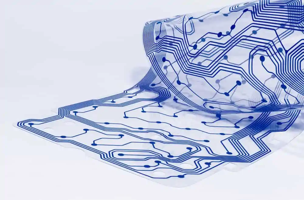 Electronic,Flex,Circuit,Board.,Clear,Membrane,Of,Dismantled,Computer,Keyboard. Flex PCB technology allows electronics to take shapes that would otherwise be impossible.