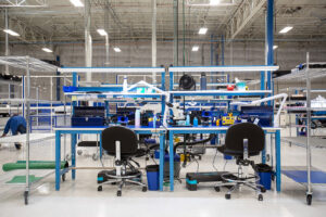 Flex circuit board assembly simplifies testing and system integration compared to traditional wire harness technology